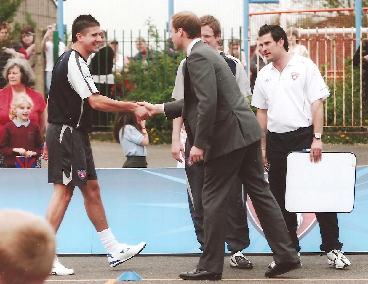 photo Paul-with-HRH-shaking-hands.jpg